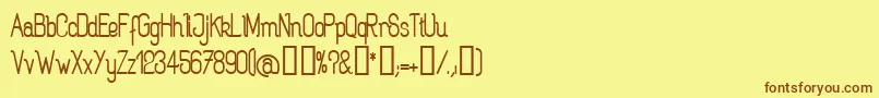 フォントROGAB    – 茶色の文字が黄色の背景にあります。