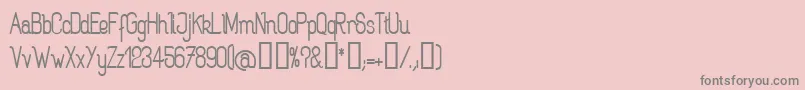 フォントROGAB    – ピンクの背景に灰色の文字