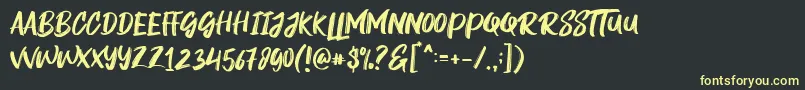 Rogeu Font – Yellow Fonts on Black Background
