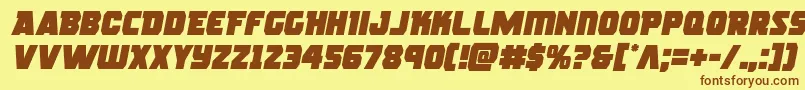 フォントrogueherosemital – 茶色の文字が黄色の背景にあります。