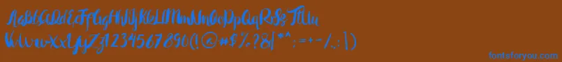 Czcionka Rohman Regular – niebieskie czcionki na brązowym tle