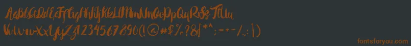 Rohman Regular-fontti – ruskeat fontit mustalla taustalla