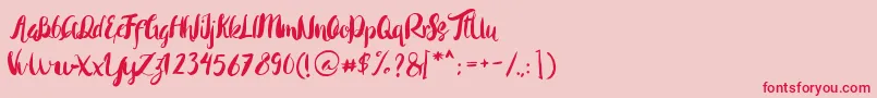 Rohman Regular Font – Red Fonts on Pink Background