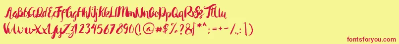 Rohman Regular-Schriftart – Rote Schriften auf gelbem Hintergrund