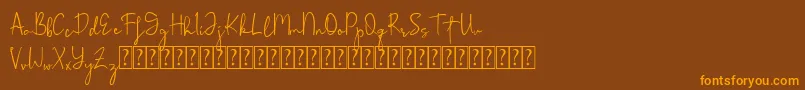 Rohmathan Font – Orange Fonts on Brown Background
