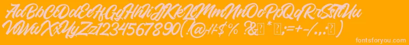 Czcionka Roland – różowe czcionki na pomarańczowym tle