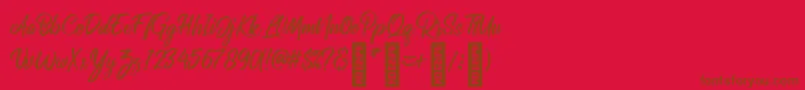 Czcionka RolleteQaku Regular – brązowe czcionki na czerwonym tle