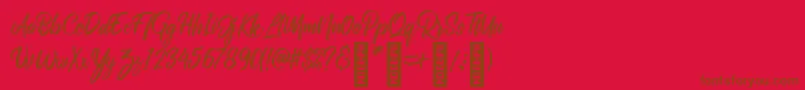 RolleteQaku Regular Font – Brown Fonts on Red Background