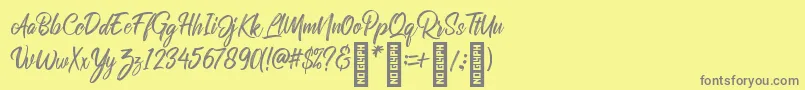 RolleteQaku Regular Font – Gray Fonts on Yellow Background