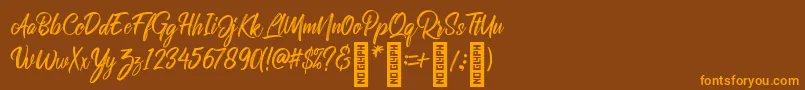 RolleteQaku Regular Font – Orange Fonts on Brown Background