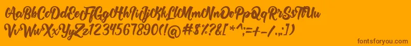 Rolyta   Demo-Schriftart – Braune Schriften auf orangefarbenem Hintergrund