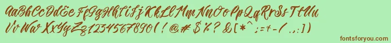 フォントRomansa – 緑の背景に茶色のフォント