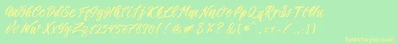 Romansa Font – Yellow Fonts on Green Background