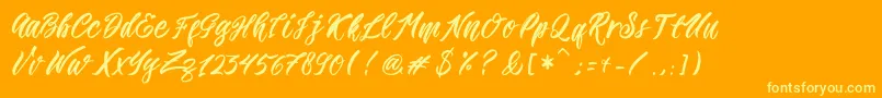 Romansa Font – Yellow Fonts on Orange Background