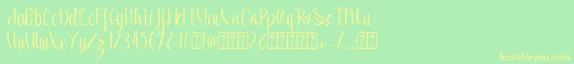 Romansha Font – Yellow Fonts on Green Background