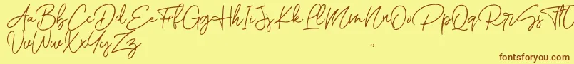 Fonte Romantic Couple Script – fontes marrons em um fundo amarelo