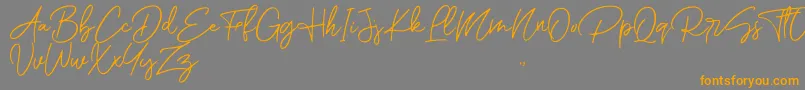 Romantic Couple Script-Schriftart – Orangefarbene Schriften auf grauem Hintergrund