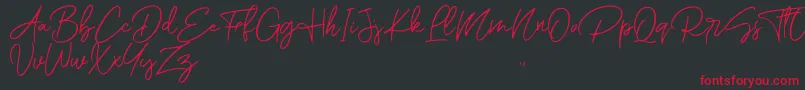 Czcionka Romantic Couple Script – czerwone czcionki na czarnym tle