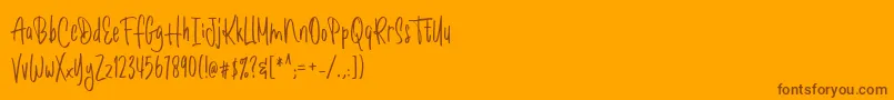 Romantick Font – Brown Fonts on Orange Background