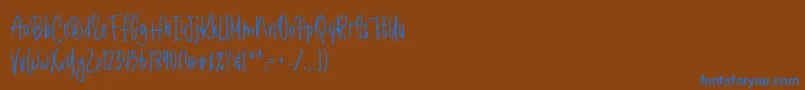 Шрифт Romantick – синие шрифты на коричневом фоне