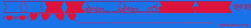 Romantine Dingbats-fontti – punaiset fontit sinisellä taustalla