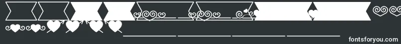 Romantine Dingbats Font – White Fonts on Black Background