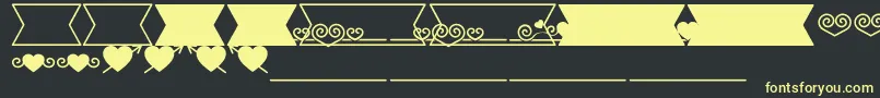 Romantine Dingbats Font – Yellow Fonts on Black Background