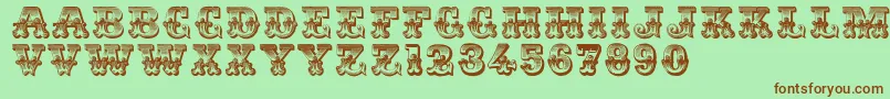 Romantiques Font – Brown Fonts on Green Background