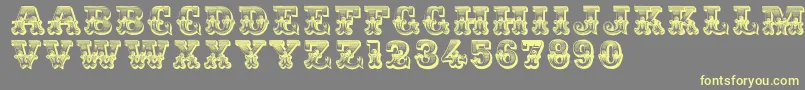 Romantiques Font – Yellow Fonts on Gray Background