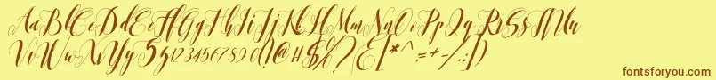 romantis momen-Schriftart – Braune Schriften auf gelbem Hintergrund