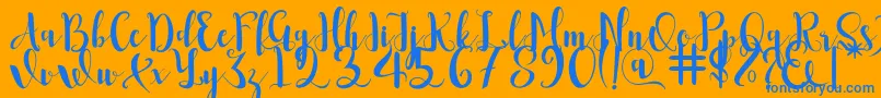 Romantis Font – Blue Fonts on Orange Background