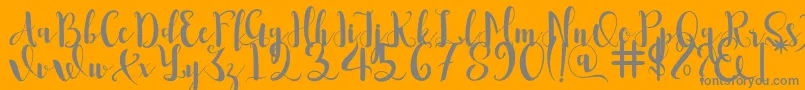 Romantis Font – Gray Fonts on Orange Background