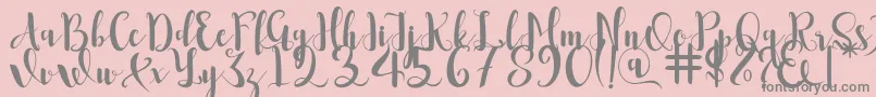 Romantis Font – Gray Fonts on Pink Background