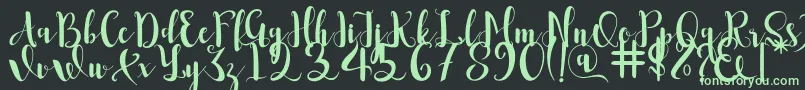 Romantis Font – Green Fonts on Black Background