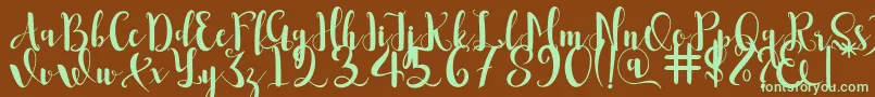 Romantis Font – Green Fonts on Brown Background