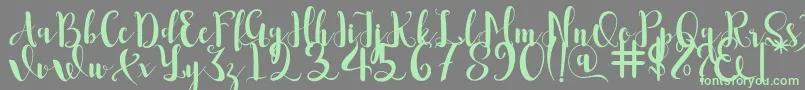 Romantis Font – Green Fonts on Gray Background