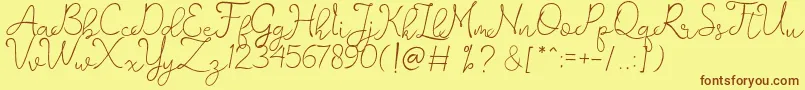 romantisch   personal use-fontti – ruskeat fontit keltaisella taustalla