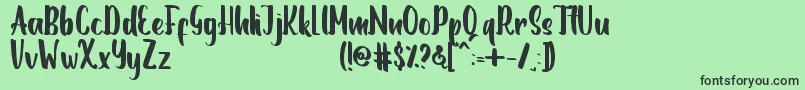 Więcej informacji o czcionce Romanttica Czcionka Romanttica – czarne czcionki na zielonym tle