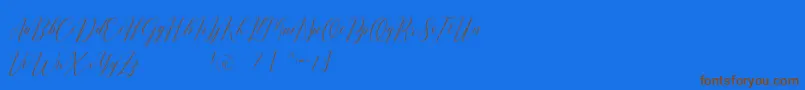 Czcionka Romarya dafont – brązowe czcionki na niebieskim tle