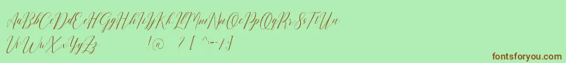 Romarya dafont-Schriftart – Braune Schriften auf grünem Hintergrund