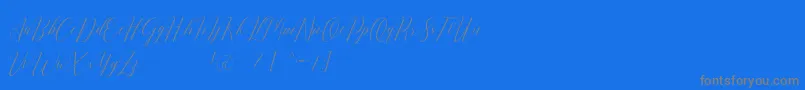 Czcionka Romarya dafont – szare czcionki na niebieskim tle