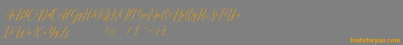 Romarya dafont Font – Orange Fonts on Gray Background