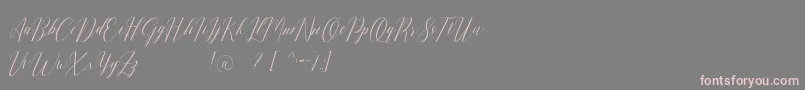 Шрифт Romarya dafont – розовые шрифты на сером фоне