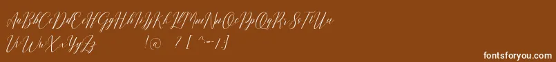 Romarya dafont Font – White Fonts on Brown Background