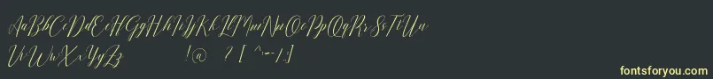 Romarya dafont Font – Yellow Fonts on Black Background
