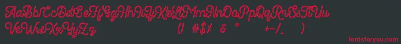 フォントRomedhal Script Stamp – 黒い背景に赤い文字
