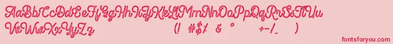 Romedhal Script Stamp Font – Red Fonts on Pink Background