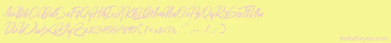 Fonte Rommantis – fontes rosa em um fundo amarelo