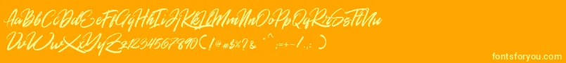 Rommantis Font – Yellow Fonts on Orange Background