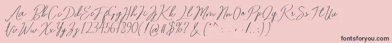 フォントRomtthing Free – ピンクの背景に黒い文字